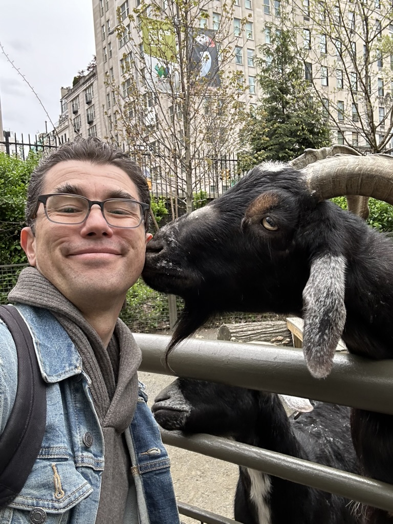 Sebastian Girner picture with a goat.
